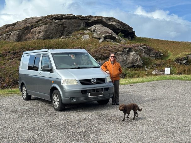 Vanessa with her van and Jeff the dog